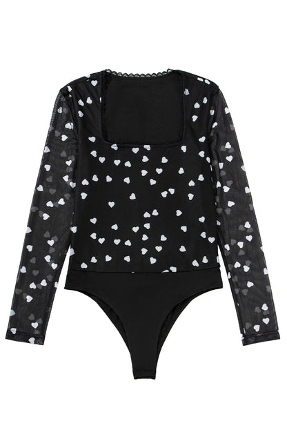 K.B. Shaws: Playful Black Heart Print Mesh Bodysuit