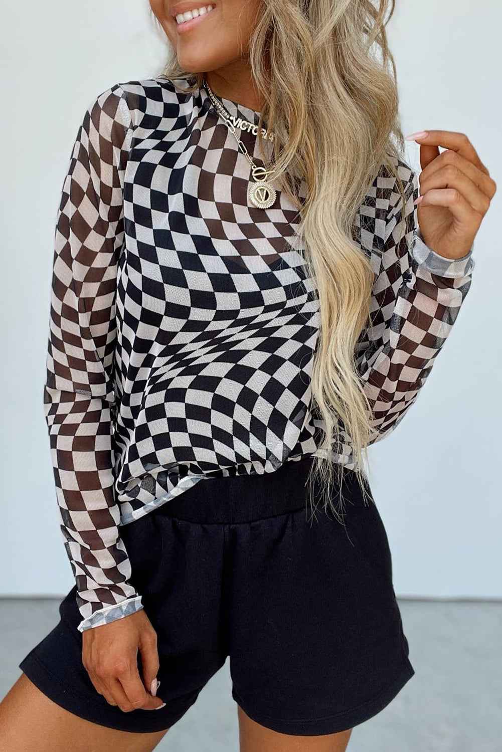 K.B. Shaws: Black Checkered Mesh Long Sleeve Top