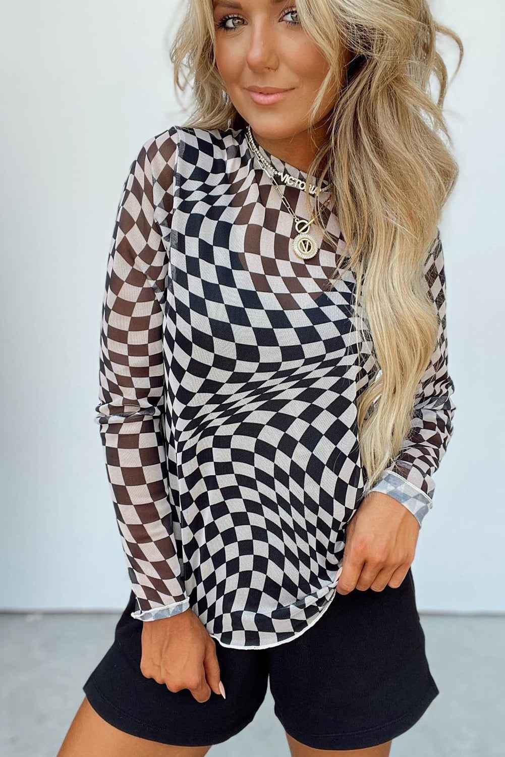 K.B. Shaws: Black Checkered Mesh Long Sleeve Top